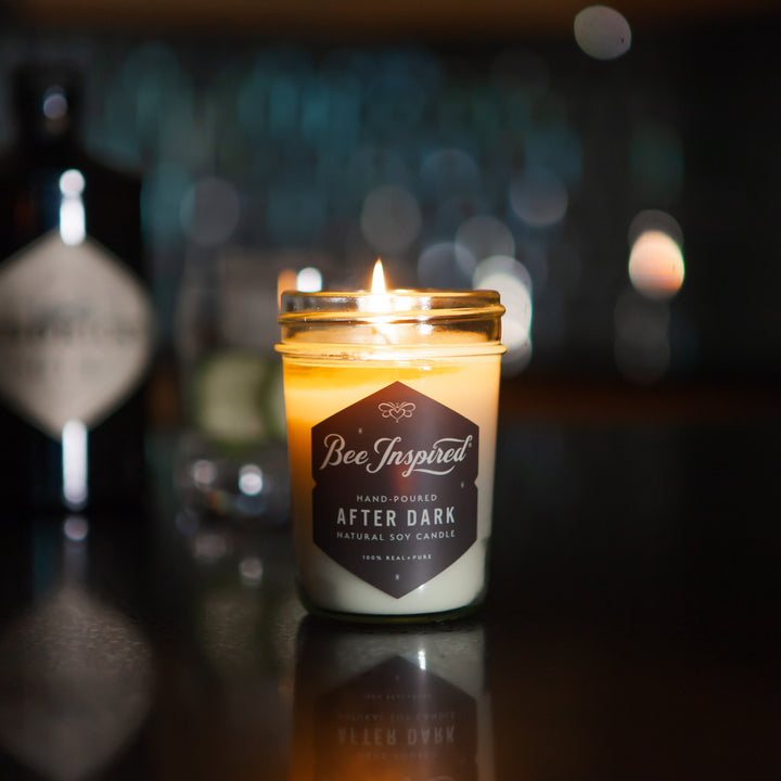 After Dark jelly jar candle burning on counter 