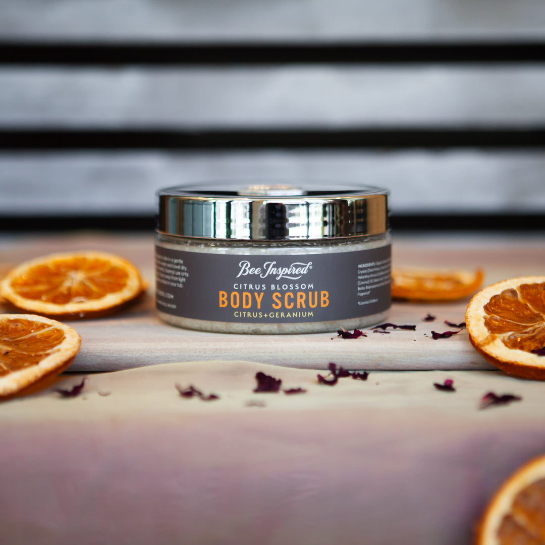 citrus blossom scrub on table with dried oranges 