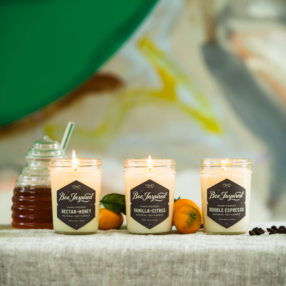 gourmand candle set burning with citrus and honey