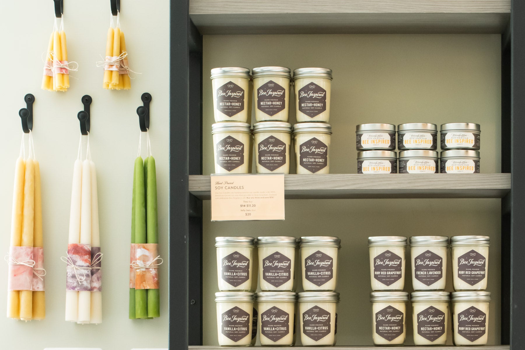 Honey house candle display with jelly jar, ceremony, and taper candles 