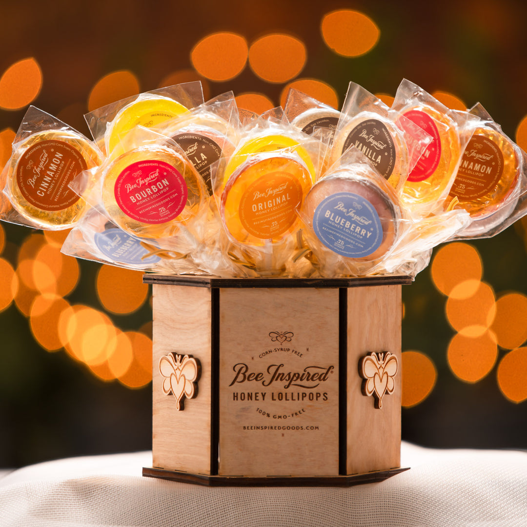 lollipops in the lollipop display from bee inspired honey retail store in owings mills with lights in the background