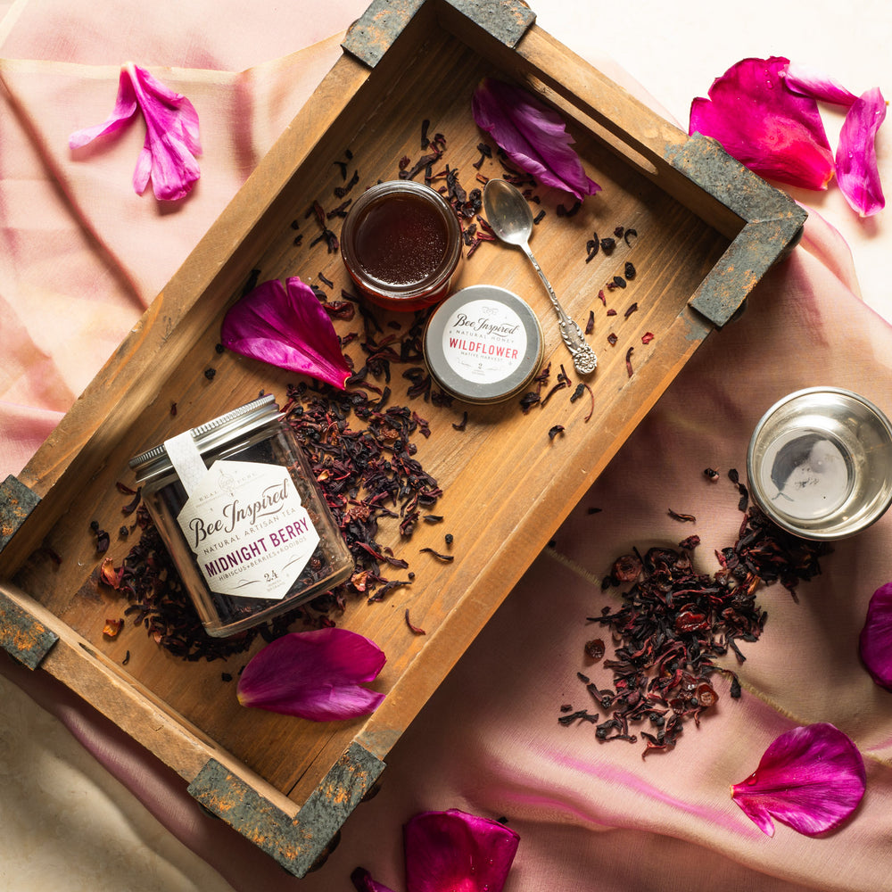 Midnight Berry Tea on tray with wildflower honey