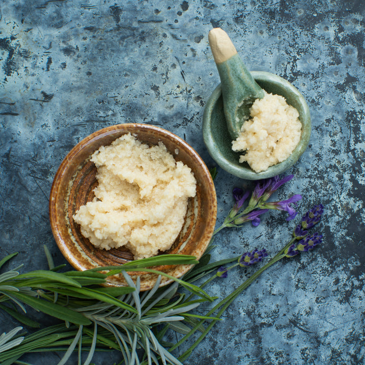 peace body scrub in two bowls with lavender