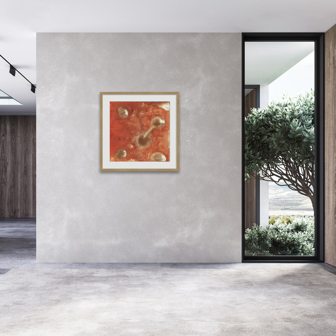 Living room with with gold and red painting on the wall 