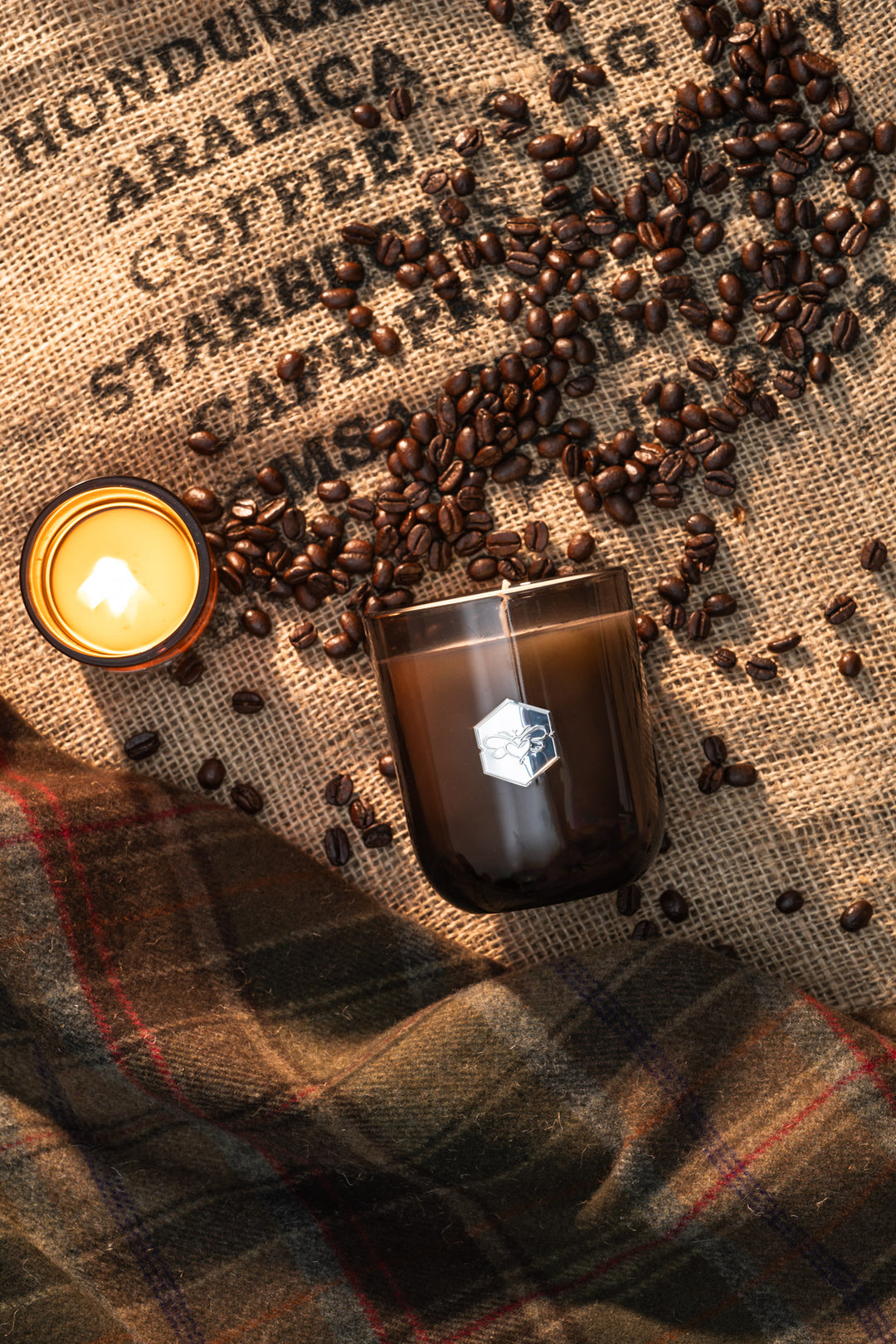 Double Espresso luxe candle burning with espresso beans 