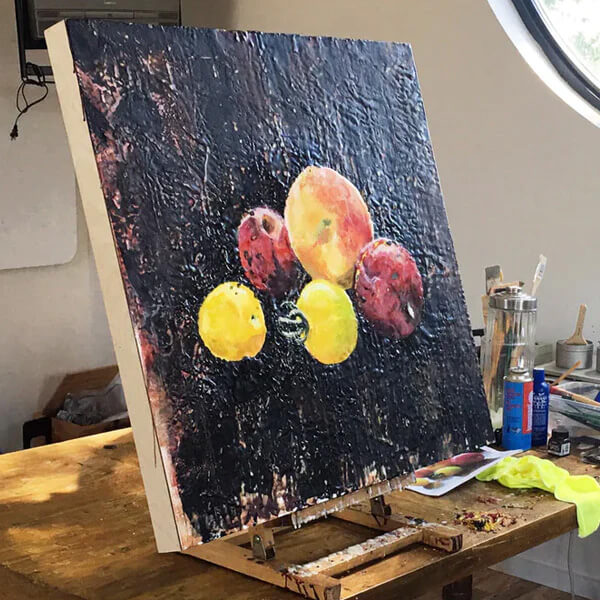 Painting of fruit on black background