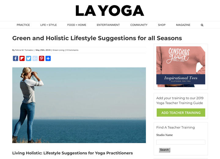 Image of LA Yoga article with an image of a woman standing by the water 