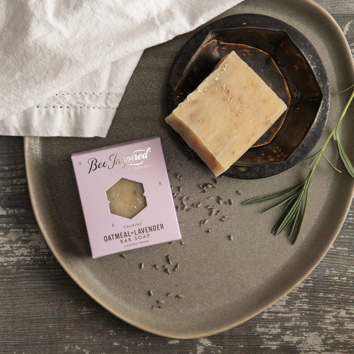 Oatmeal+Lavender bar soap on plate with dried lavender 