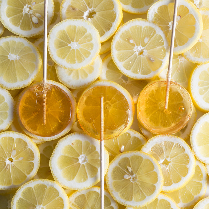 lemon lollipops on lemon slices