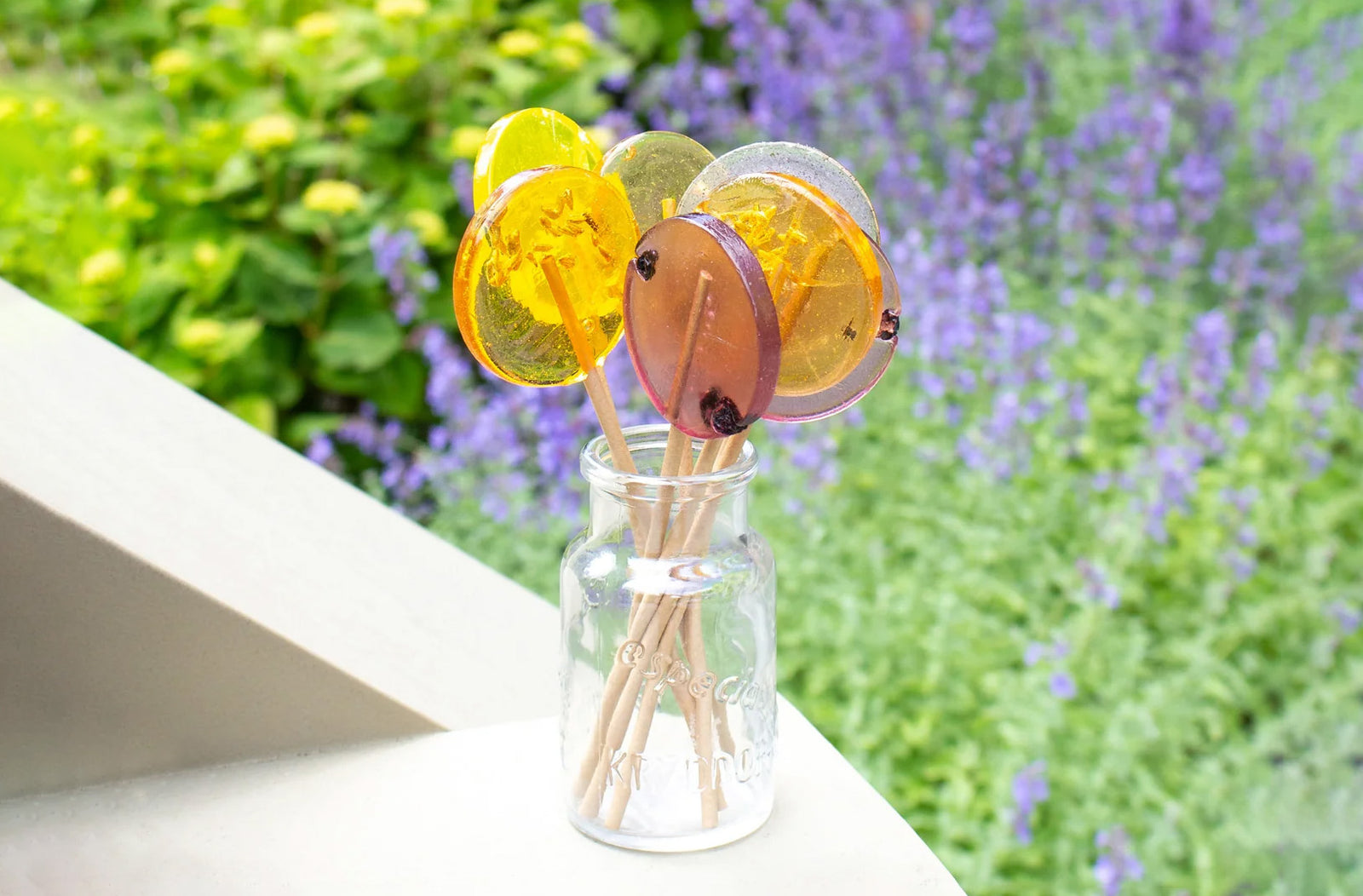 Bouquet of varietal lollipops in front of lavender field