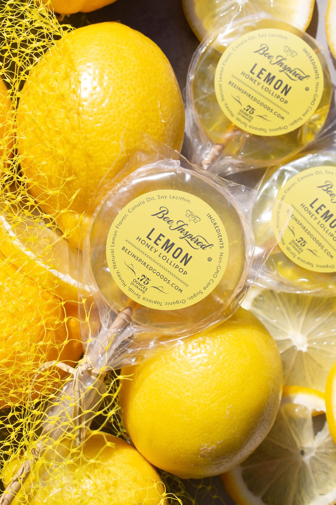 lemon lollipops from bee inspired honey retail store in owings mills on top of whole lemons