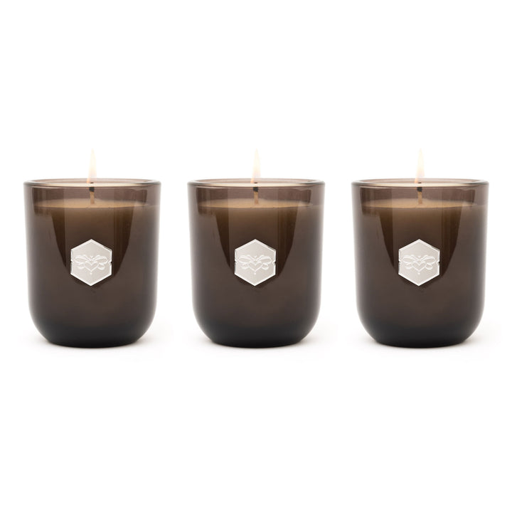 Three luxe candles on white 