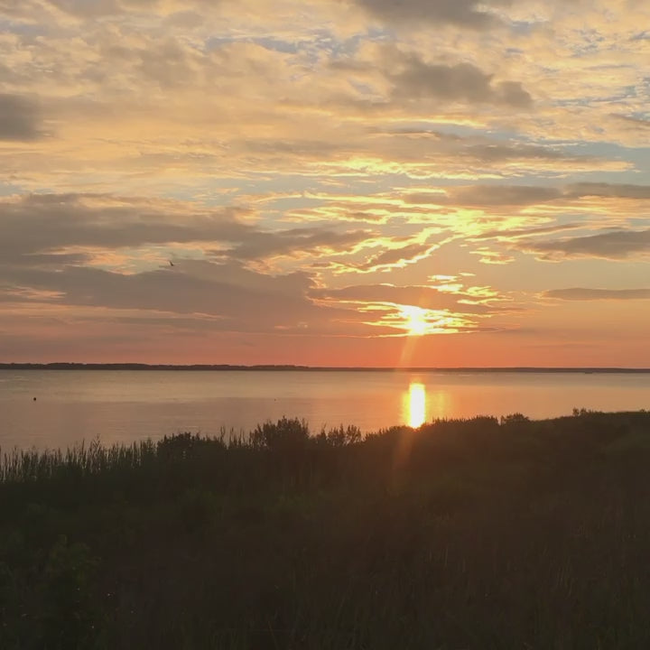 video of sunset over water 