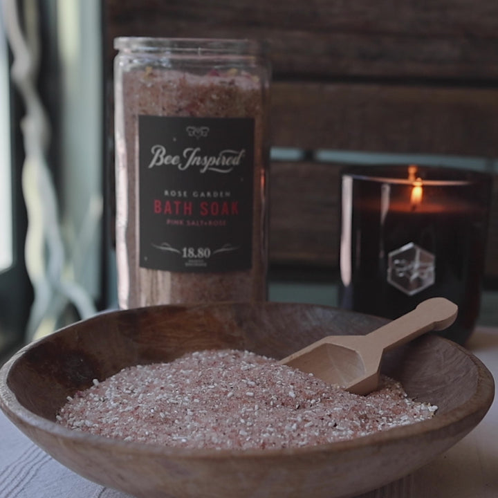 rose garden bath soak from bee inspired honey retail store in owings mills being scooped by a person