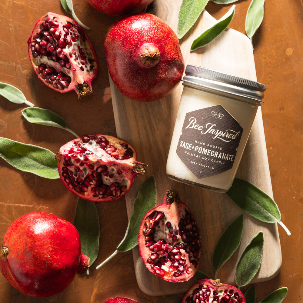 Sage+Pomegranate jelly jar candle flat lay with pomegranates 