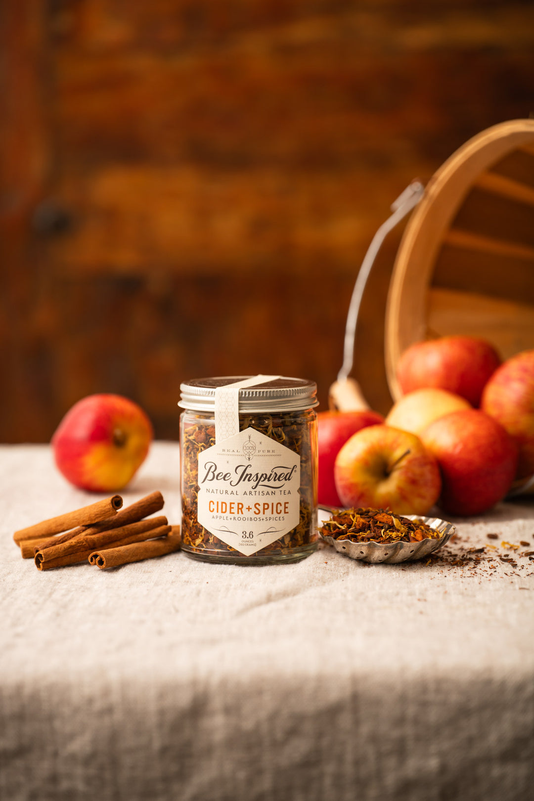 Cider and Spice Tea with cinnamon sticks and apples 