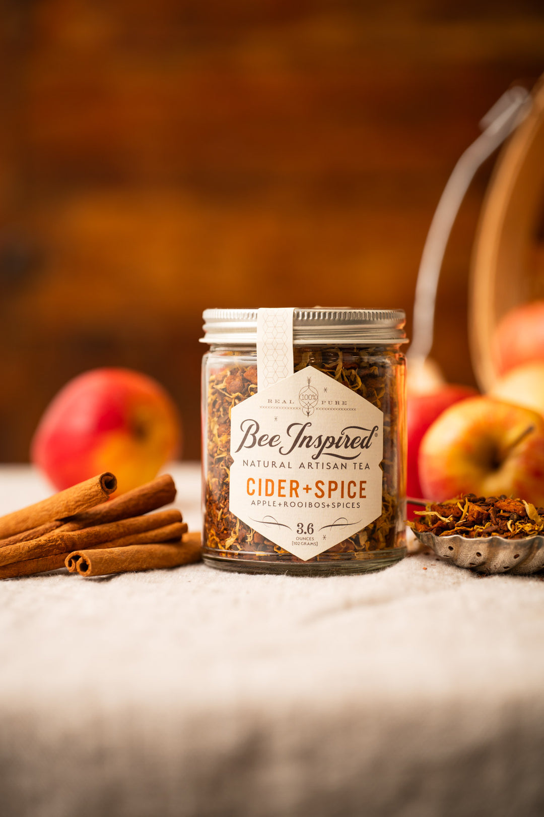 Cider and Spice Tea with apples and cinnamon sticks 