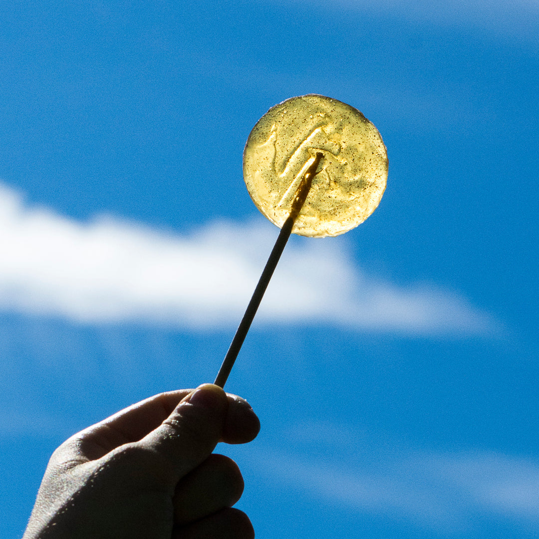 vanilla lollipop against sky